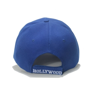 Detail of adjustable back strap on navy blue baseball cap with white Hollywood embroidery