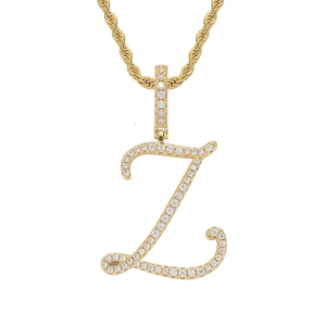 Macro detail of 18K gold letter Z pendant featuring shimmering micro-pave cubic zirconia