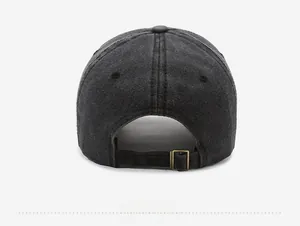 Detail view of washed denim baseball cap with adjustable metal buckle and vintage back strap