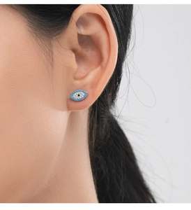 Close-up of S925 sterling silver evil eye stud earrings with turquoise and white stones