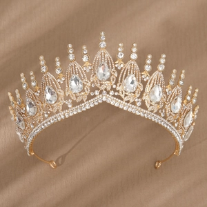 Luxurious baroque bridal crown with sparkling pear-shaped crystals on gold alloy