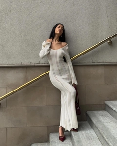 Detailed knit texture and hollow-out pattern on this white V-neck knitted dress