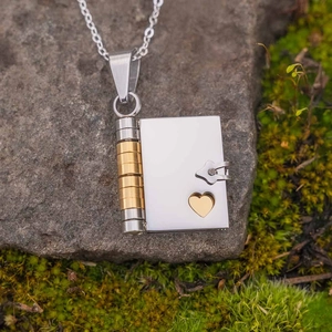 Locket book necklace in stainless steel with golden heart detail on mossy stone
