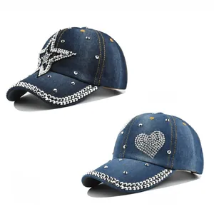 Detail of denim baseball caps with rhinestone stars, hearts and studded brim accents