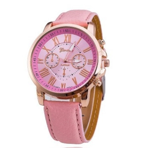 Macro detail of pink leather strap and rose gold quartz watch case with Roman numerals