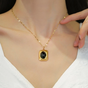 Vintage gold titanium steel necklace with a square pendant and black faceted onyx gemstone