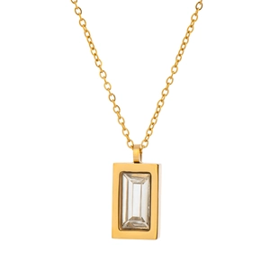Detailed close-up of a gold rectangular pendant with a clear zircon stone on a fine chain