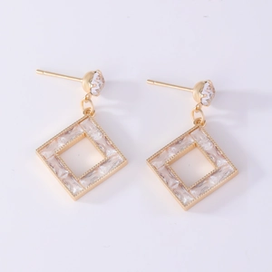 Golden square geometric drop earrings featuring sparkling cubic zirconia crystals