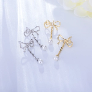 Elegante Gold- und Silber-Schleifen-Ohrringe mit Quasten, Zirkonia und weißen Perlen