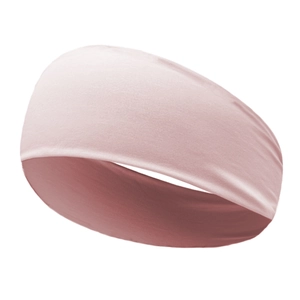 Close-up of seamless pink yoga headband with soft knit texture for athletic wear