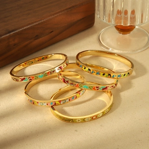 Set of five 18K gold plated stainless steel enamel bangles with colorful floral patterns