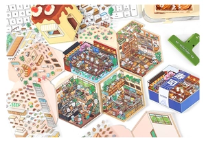 Detailed flat lay of miniature sushi shop and bakery stickers for DIY scrapbooking
