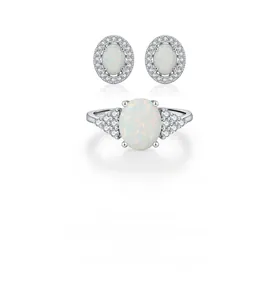 Detailed view of S925 silver opal jewelry set with earrings and hallmarked ring