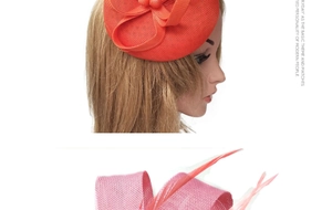 Detail view of orange bow fascinator and fuchsia feather headpiece for parties