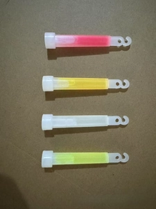 Detail view of four-color 4-inch glow sticks with hook design for emergency use
