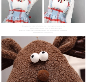 Detail of plush reindeer head and red plaid dress with white knit texture