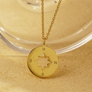 Minimalist gold titanium steel compass pendant necklace with hollow star and N E S W engraving