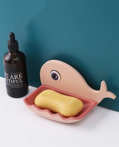 Detail of creative whale soap dish with double-layer drainage and wave-edge tray