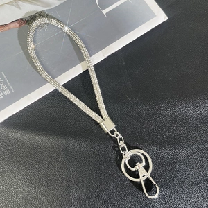 Detail of silver rhinestone lanyard with sparkling crystals and rotatable metal hook clasp