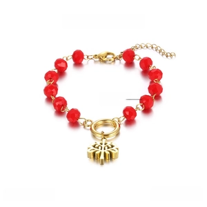 Detail of red crystal beaded bracelet with golden tree of life charm and size metrics