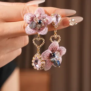 Vintage asymmetric pink embroidered flower earrings with crystals in gold finish