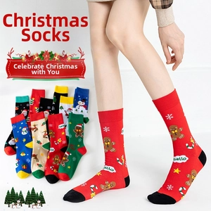 Detail of Christmas cotton socks featuring festive patterns and colorful contrast heels