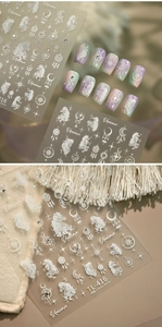 Detailed view of TL-416 white unicorn and dreamcatcher nail art stickers on transparent film