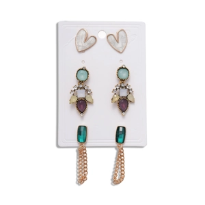 Set vintage de six pièces comprenant clous de cœur, pendentifs pierres et boucles à franges