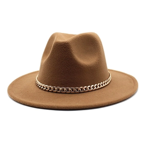 Detail of the brown wool fedora hat featuring a stylish chunky gold metal chain link