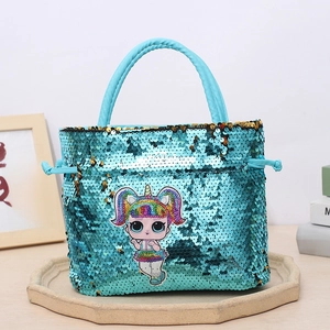 Detail of blue sequined girls handbag featuring cartoon character and drawstring handle
