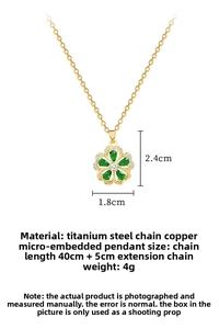 Detail of five-petal green gemstone flower pendant with gold chain and crystals