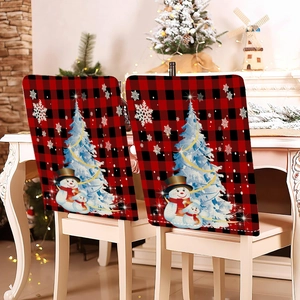 Christmas chair covers featuring red plaid designs with white trees and snowmen for decor