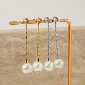 Boucles d'oreilles longues à pampilles en perles dorées et argentées avec cristaux