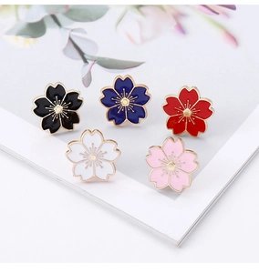 Detailed set of five colorful sakura flower brooches in enamel with gold-tone accents