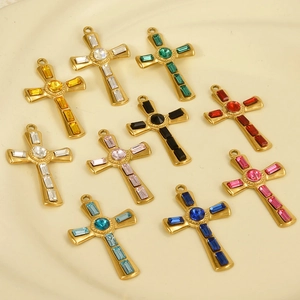 Detailed view of assorted colorful crystal cross pendants with golden 304 stainless steel base