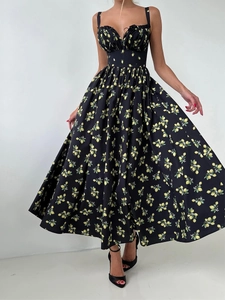 Close-up of floral strap dress featuring yellow lemon prints and sweetheart neckline