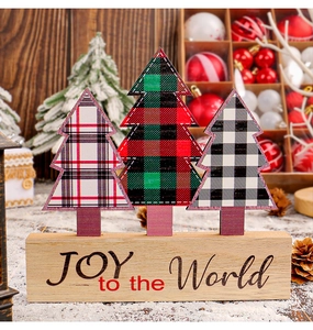 Christmas wooden tabletop decor with three plaid trees on a base titled JOY to the World