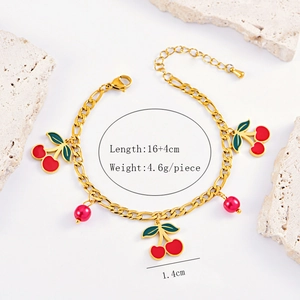 Detailed view of red enamel cherry bracelet with dimensions 16 plus 4 cm and 4.6 grams
