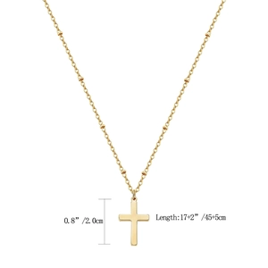 Minimalist 18K gold plated stainless steel cross pendant necklace on white background