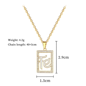 Detailed view of hollow square Fe pendant with crystals and dimensions 2.9cm x 1.5cm