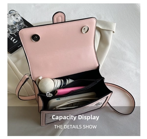 Pink PU leather crossbody bag interior showing spacious room for phone and umbrella