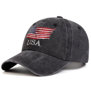 Detail of vintage gray washed cotton baseball cap with American flag and USA embroidery