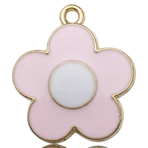 Close-up of pink flower keychain charm with gold metal frame and white center detail