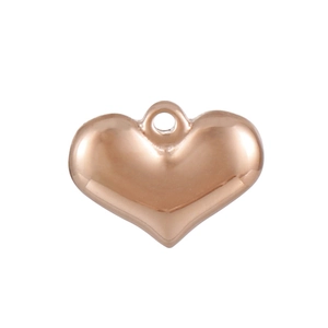 Polished rose gold 3D heart pendant made of stainless steel on white background