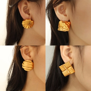 Four pairs of geometric gold titanium earrings with textured vintage square designs