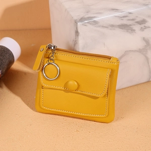 Compact yellow faux leather zip wallet with front flap pocket and metal keychain ring