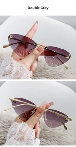 Detail of rimless cat eye sunglasses with grey gradient lenses and diamond F logo