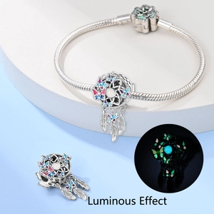 Luminous dreamcatcher charm bracelet in silver with colorful butterfly and feather dangles