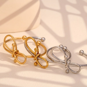 Bracelet jonc nœud minimaliste en or 18 carats et argent avec boules d'extrémité