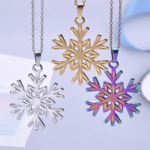 Three snowflake necklaces in gold, silver and multicolor finishes for women